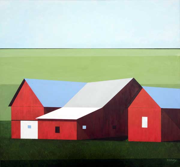 a large red barn with red  side buildings with a field of green behind